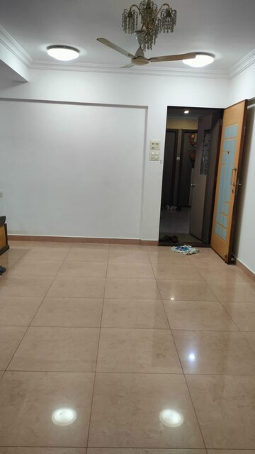 Living Room in 2 BHK Apartment at Gulmohar Upvan CHS, Gawand Baug – for Rent