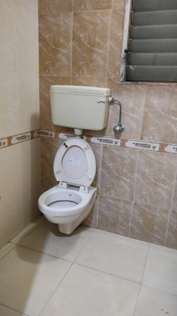 Bathroom in 2 BHK Apartment at Gulmohar Upvan CHS, Gawand Baug – for Rent