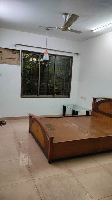 Bedroom in 2 BHK Apartment at Gulmohar Upvan CHS, Gawand Baug – for Rent