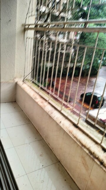 Balcony in 2 BHK Apartment at Gulmohar Upvan CHS, Gawand Baug – for Rent