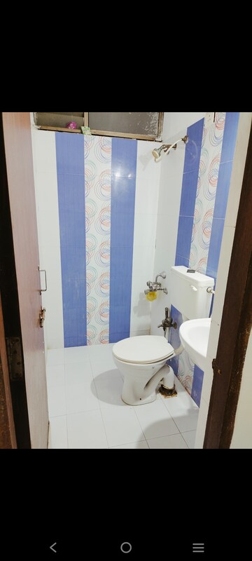 Bathroom in 2 BHK Apartment at Shree Balaji Agora Residency, Sughad – for Rent