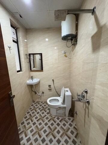 Bathroom in 2 BHK Builder Floor at Super Mart 1, Sector 27 – for Rent