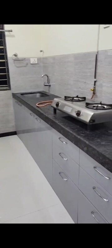 Kitchen in 2 BHK Apartment at Acme Ozone, Manpada – for Rent