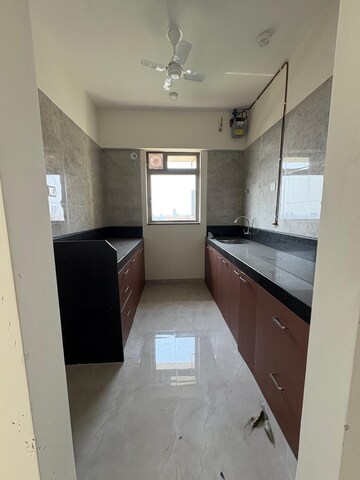 Kitchen in 2 BHK Apartment at Sheth Irene, Malad West – for Rent