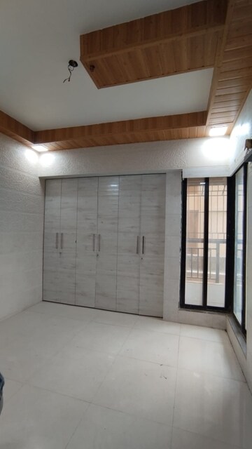 Master Bedroom in 2 BHK Apartment at Raunak City Sector 4 D10, Kalyan West – for Sale