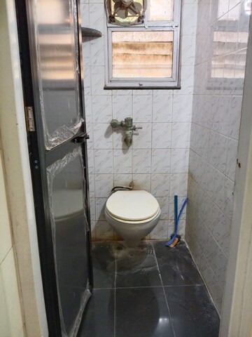 Bathroom in 1 RK Apartment at Gokul Garden CHS, Kandivali East – for Rent