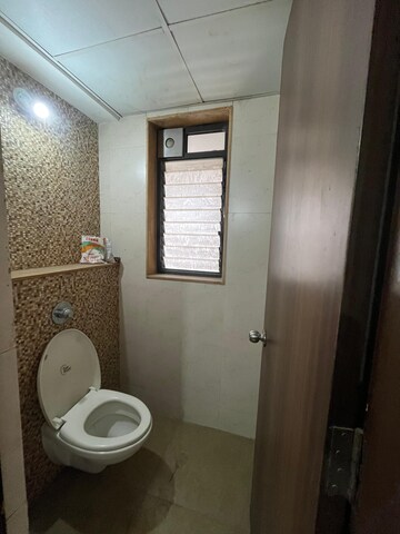 Bathroom in 1 BHK Apartment at Lodha Palava City Lakeshore Greens, Dombivli East – for Rent