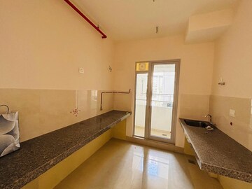Kitchen in 2 BHK Apartment at Piramal Vaikunth, Balkum Pada – for Rent