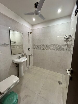 Bathroom in 3 BHK Builder Floor at Nehru Enclave – for Sale