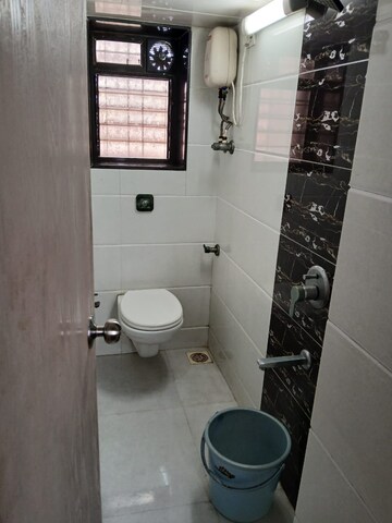 Bathroom in 2 BHK Apartment at Milap CHS, Andheri West – for Rent