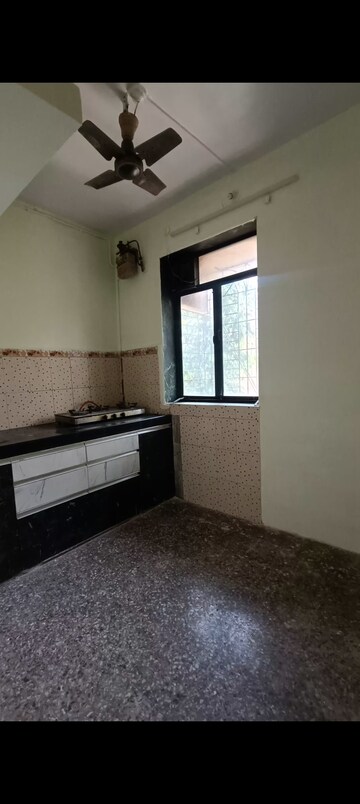 Kitchen in 1 BHK Apartment at Devdaya Nagar CHS, Shivai Nagar – for Rent