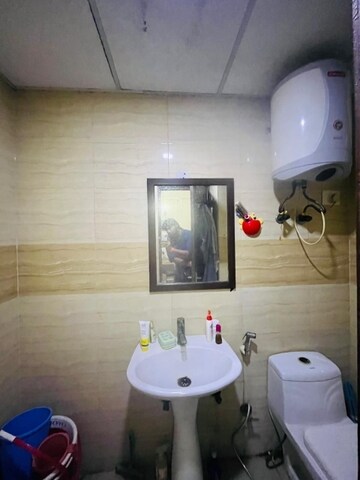 Bathroom in 1 RK Apartment at Supertech Eco Suites, Sector 137 – for Rent