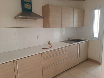 Kitchen in 2 BHK Apartment at Bhartiya Nikoo Homes Phase 2, Thanisandra Main Road – for Rent