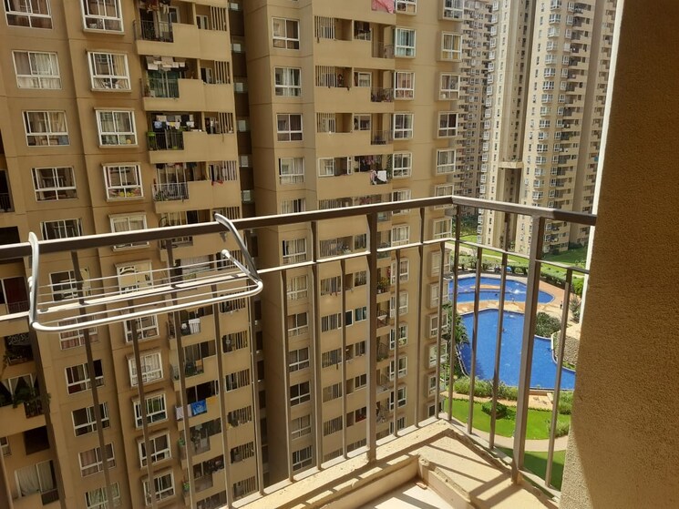 Living Room, bhartiya-nikoo-homes-phase-2 2 Bedroom 1200 Sq.Ft. Apartment In Thanisandra Main Road Bangalore 8454349