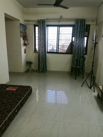 Living Room in 2 BHK Apartment at Nagari Niwara CHS, Goregaon East – for Rent