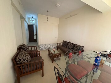 Living Room in 1 BHK Apartment at Cosmos Lounge, Manpada – for Rent