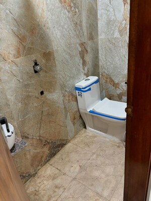 Bathroom in 4 BHK Builder Floor at Chattarpur – for Sale