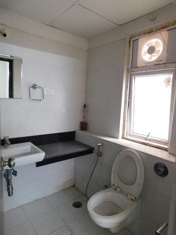Bathroom in 3 BHK Apartment at Ramky Towers, Gachibowli – for Rent