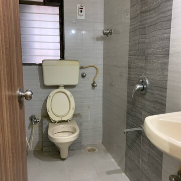 Bathroom in 2 BHK Apartment at Krishna Classic, Babhai Naka – for Rent