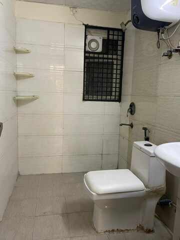Bathroom in 2.5 BHK Apartment at Amrapali Silicon City, Sector 76 – for Sale