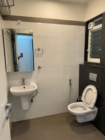 Bathroom in 2 BHK Apartment at Rustomjee Urbania Azziano, Majiwada – for Rent