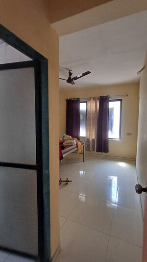 Master Bedroom in 2 BHK Apartment at Arihant Plaza CHS, Owale – for Sale