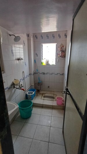 Bathroom in 2 BHK Apartment at Arihant Plaza CHS, Owale – for Sale