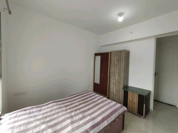 Bedroom, mittal-pebbles-high-mont 2 Bedroom 576 Sq.Ft. Apartment In Hinjewadi Pune 8454982