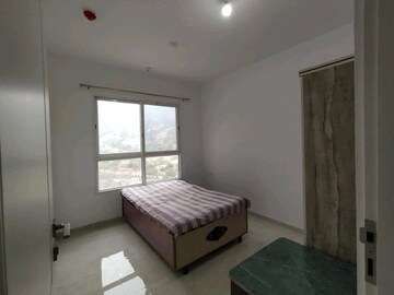Bedroom in 2 BHK Apartment at Mittal Pebbles High Mont, Hinjewadi – for Rent