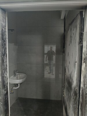 Bathroom in 3 BHK Builder Floor at Dhakoli Village – for Sale