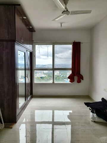 Living Room in 2 BHK Apartment at Mittal Pebbles High Mont, Hinjewadi – for Rent