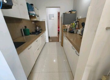 Kitchen in 3 BHK Apartment at Puranik Rumah Bali, Ghodbunder Road – for Rent