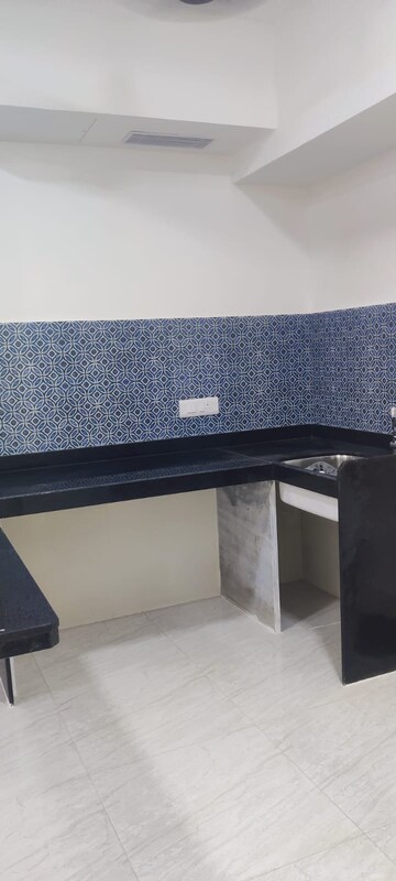 Kitchen in 1 BHK Apartment at Lodha Crown Quality Homes, Majiwada – for Sale