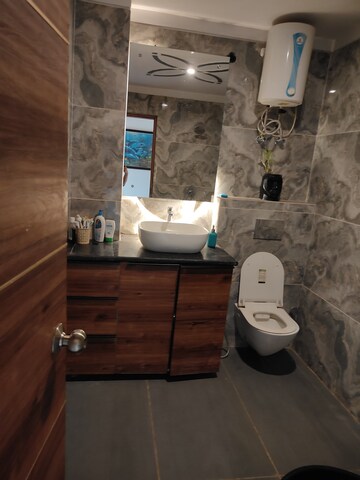Bathroom in 4 BHK Apartment at Ansal API Esencia, Sector 67 – for Rent