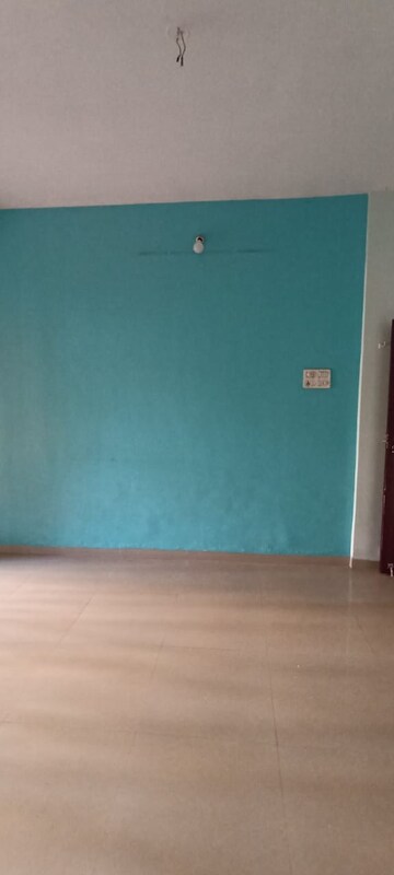 Master Bedroom in 1 BHK Apartment at Rutu  Riverview Classic Building No 2 Phase 2, Kalyan West – for Sale