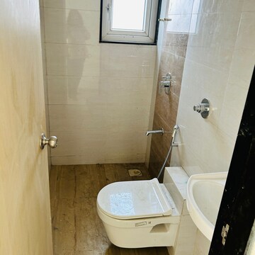 Bathroom in 1 BHK Apartment at Haware Intelligentia Sigma South, Tagore Nagar – for Sale