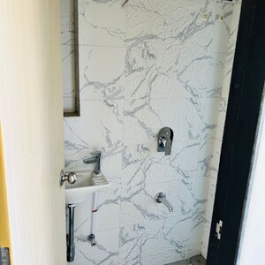 Bathroom in 1 BHK Apartment at Haware Intelligentia Sigma South, Tagore Nagar – for Sale