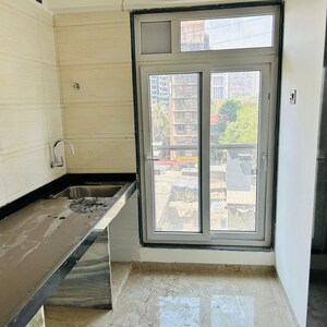 Kitchen in 1 BHK Apartment at Haware Intelligentia Sigma South, Tagore Nagar – for Sale