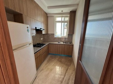 Kitchen in 3 BHK Apartment at Ambience Creacions, Sector 22 – for Rent