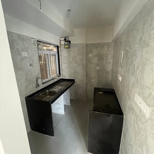 Kitchen in 1 BHK Apartment at Vaibhavlaxmi East Syde, Naidu Colony – for Sale