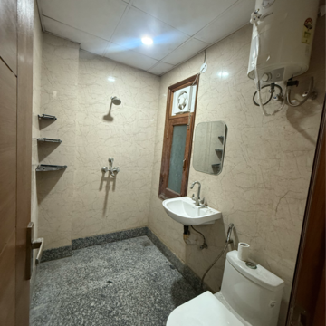 Bathroom in 1.5 BHK Builder Floor at Sector 63a – for Rent