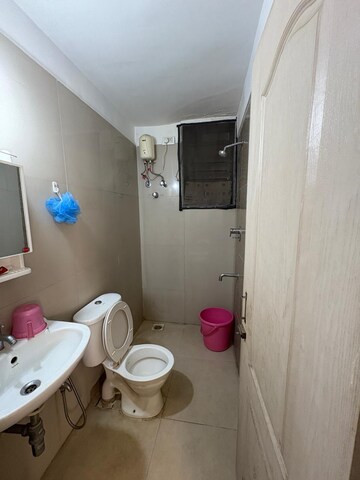Bathroom in 2 BHK Apartment at Rutu Enclave, Kasarvadavali – for Rent