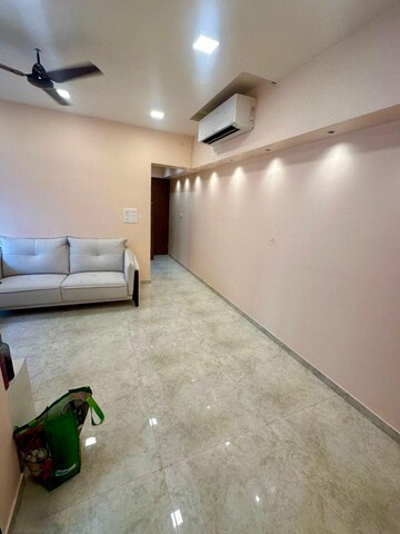 Living Room in 2 BHK Apartment at Lodha Amara, Kolshet Road – for Sale