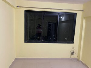 Living Room in 1 BHK Apartment at Rutu Enclave, Kasarvadavali – for Sale