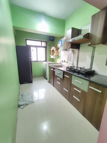 Kitchen in 1 BHK Apartment at Puranik City, Kasarvadavali – for Rent