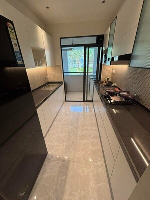 Kitchen in 2.5 BHK Apartment at Mohan Altezza, Wayle Nagar – for Sale