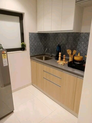 Kitchen in 1 BHK Apartment at Ace Courtyard, Ghodbunder Road – for Sale