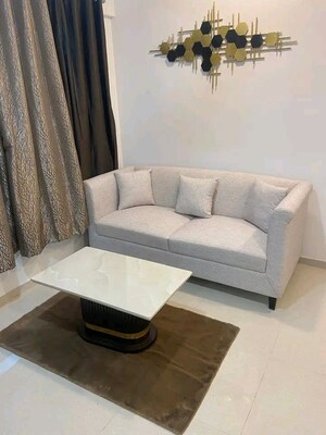 Living Room in 1 BHK Apartment at Ace Courtyard, Ghodbunder Road – for Sale