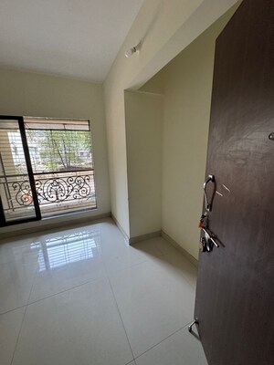 Living Room in 2 BHK Apartment at Nalanda CHS Naya Nagar, Naya Nagar – for Sale