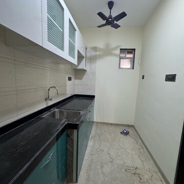Kitchen in 1 BHK Apartment at Haware Intelligentia Sigma South, Tagore Nagar – for Rent